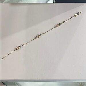 Elegant Gold and Silver Bracelet